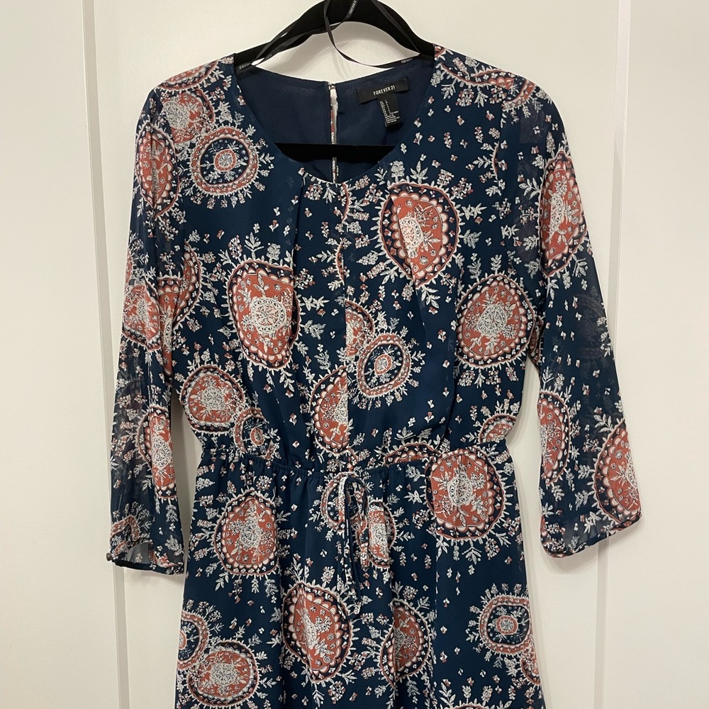 Forever 21 bohemian pattern flowy dress with a singed waist